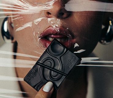 Girl eating a chocolate